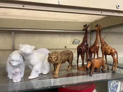 Lot 309 - An assortment of eight figures of animals to...