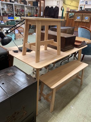 Lot 80 - A contemporary limed kitchen table with two...