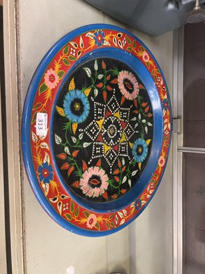 Lot 313 - An eastern style lacquered circular tray with...