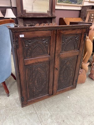 Lot 85 - An oak two door wall cabinet