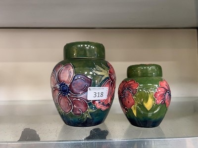 Lot 318 - A graduating pair of green ground Moorcroft...