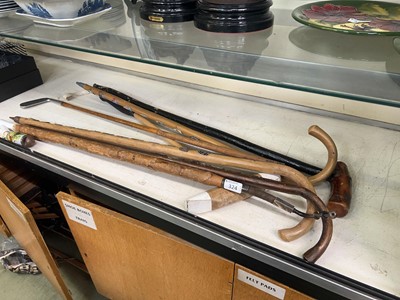 Lot 324 - An assortment of walking sticks, shillelagh,...