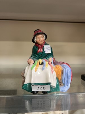 Lot 328 - A Royal Doulton figurine 'Silks And Ribbons'
