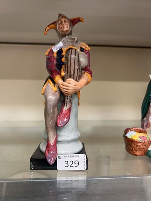 Lot 329 - A Royal Doulton figurine 'The Jester'