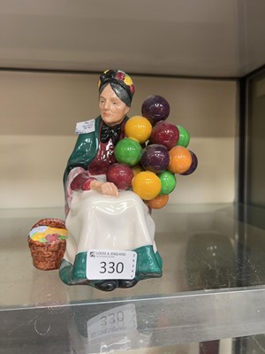 Lot 330 - A Royal Doulton figurine 'The Old Balloon Seller'