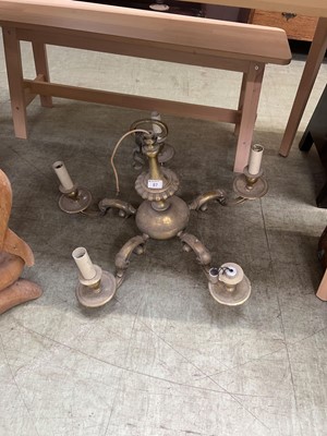 Lot 87 - A metal five branch candelabra