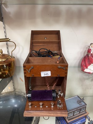 Lot 345 - An early 20th century electric shock device