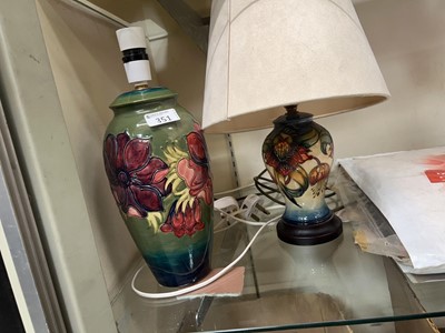 Lot 351 - A green ground Moorcroft table lamp along with...