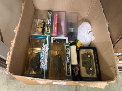 Lot 353 - A box containing an assortment of die cast...