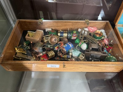 Lot 365 - A small wooden display case containing...