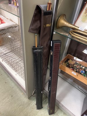Lot 367 - Three Riley pool/snooker cues, one cased, two...