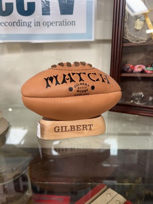 Lot 371 - A collectible miniature Gilbert rugby ball...