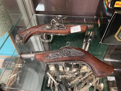Lot 377 - A pair of replica flintlock pistols
