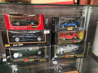 Lot 378 - Six boxed Burago die cast scale model vehicles...