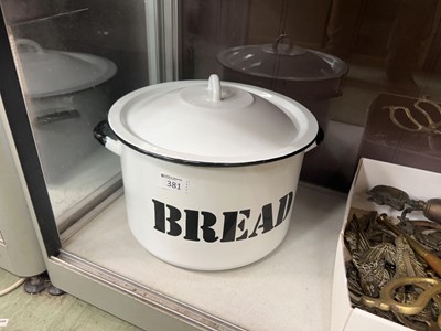 Lot 381 - A white enamelled twin handled bread bin
