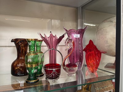 Lot 385 - Eight items of decorative coloured glassware...