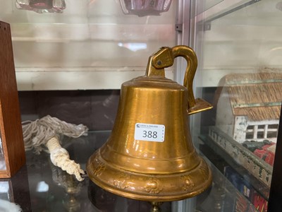 Lot 388 - A brass effect hanging bell