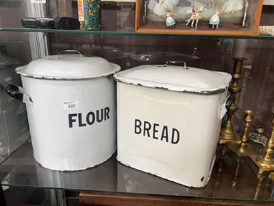 Lot 389 - A white enamelled lidded flour pot along with...