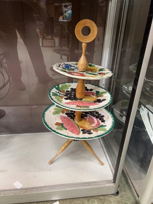 Lot 404 - A Portuguese studio pottery three tier cake stand