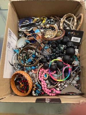 Lot 411 - A box of assorted dress jewellery to include...