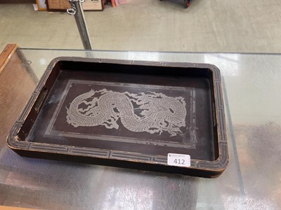 Lot 412 - A wooden tray with white metal dragon decoration