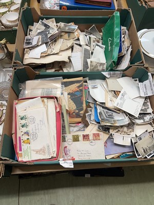 Lot 435 - Two trays of various vintage photos, stamps, etc