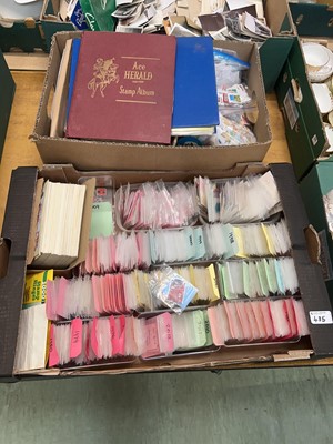 Lot 485 - Two trays containing an assortment of stamps,...