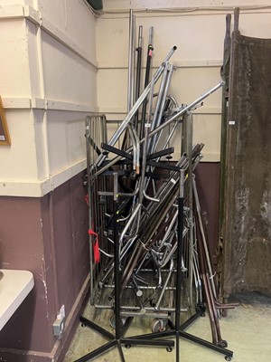 Lot 129 - An assortment of clothing rails and stands