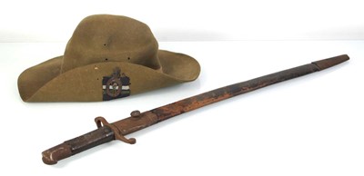 Lot 82 - A Second World War Burma hat dated 1943 with a...