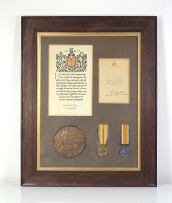 Lot 84 - A framed pair of First World War medals...