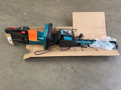 Lot 4089 - Makita cordless hedge trimmer with charger (no...