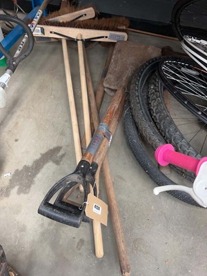 Lot 4124 - Selection of spades, brushes and a pick axe