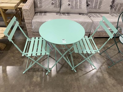 Lot 4243 - Turquoise folding metal circular garden table...