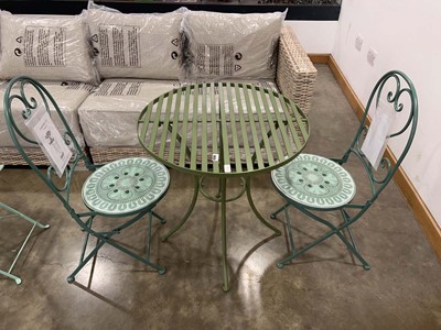 Lot 4244 - Green metal circular garden table and 2...