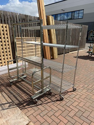 Lot 4316 - 4 wheeled 4 tier metal wire rack plus 4...