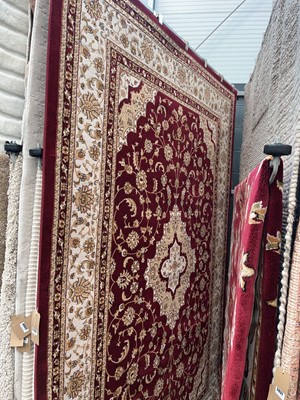 Lot 5033 - Large carpet, maroon and floral pattern