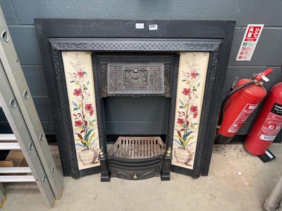 Lot 4382 - Late Victorian cast iron fire surround with...