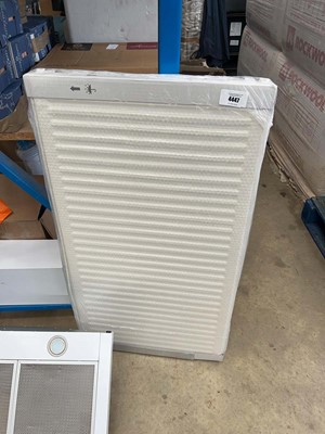 Lot 4447 - White metal wall mounted radiator