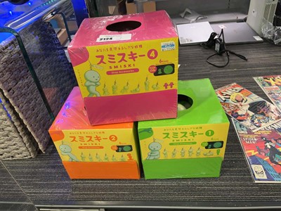 Lot 2124 - 3 boxes containing Smiski strap accessories in...