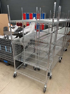 Lot 4479 - 4 wheeled 4 tiered metal wire shelving rack