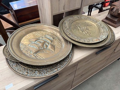 Lot 5210 - Quantity of beaten brass plaques
