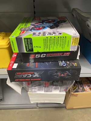 Lot 2203 - Four boxes containing various drones & quad...