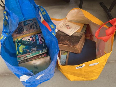 Lot 5297 - 2 bags containing Biggles books, and other...
