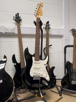 Lot 2305 - Six string electric guitar in black and white