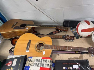 Lot 2313 - Two acoustic guitars and one electric guitar