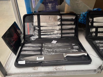 Lot 3261 - Japanese hardened steel samurai knife set