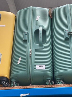Lot 3266 - Large hard shelled American Tourister suitcase