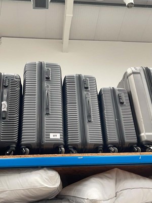 Lot 3272 - The Rock 3 piece hard shelled suitcase set