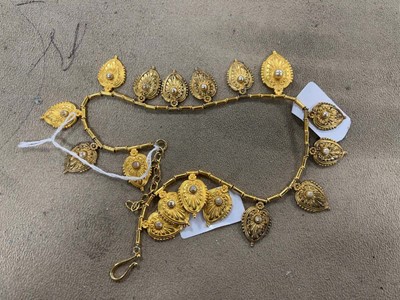 Lot 2340 - Yellow metal chain with pendants