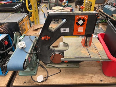 Lot 4754 - 240v Dewalt bench topped band saw and bench...